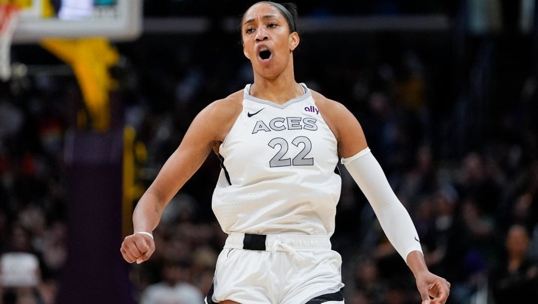 Las Vegas Aces center A'ja Wilson reacts after scoring during the first half of a WNBA basketball game against the Los Angeles Sparks, Sunday, June 9, 2024, in Los Angeles.