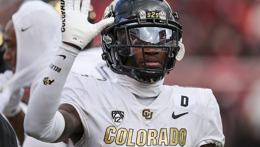 Colorado cornerback Travis Hunter reacts to a play against Utah during the first quarter of an NCAA college football game Saturday, Nov. 25, 2023, in Salt Lake City.