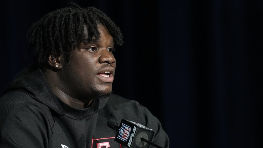 Georgia defensive lineman Jordan Davis speaks during a press conference at the NFL football scouting combine in Indianapolis, Friday, March 4, 2022. Alabama’s Nick Saban said last month that his players made more than $3 million in NIL deals over the last year and his SEC rival, Georgia's Kirby Smart, got even more specific. “We may have had the highest-paid defensive lineman last year in NIL in Jordan Davis,” Smart said.