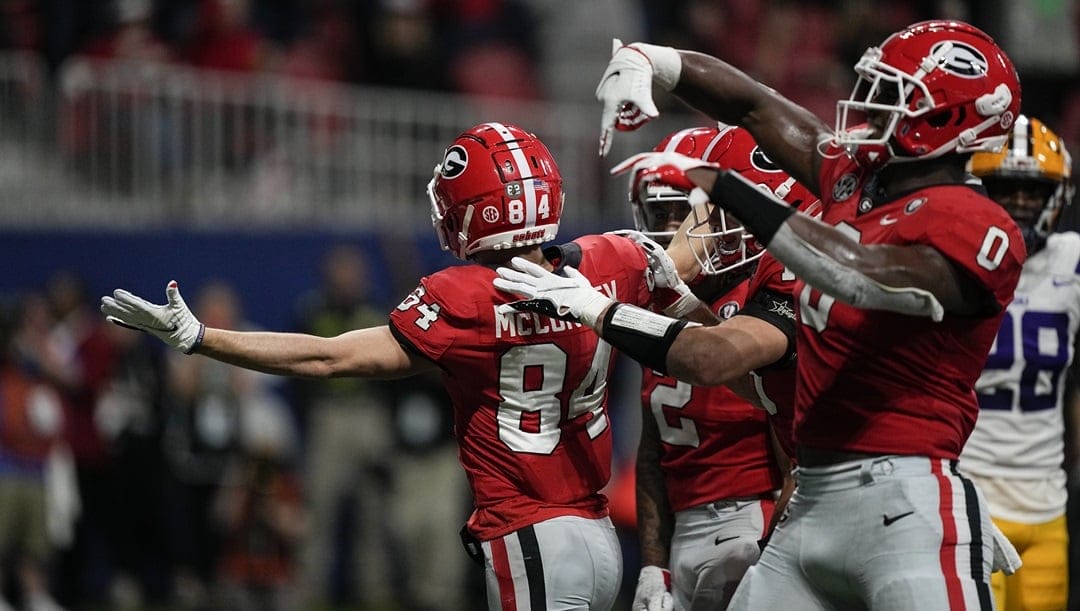 Georgia wide receiver Ladd McConkey (84) celebrates a touchdown in the first half of the Southeastern Conference championship NCAA college football game against LSU, Saturday, Dec. 3, 2022, in Atlanta.