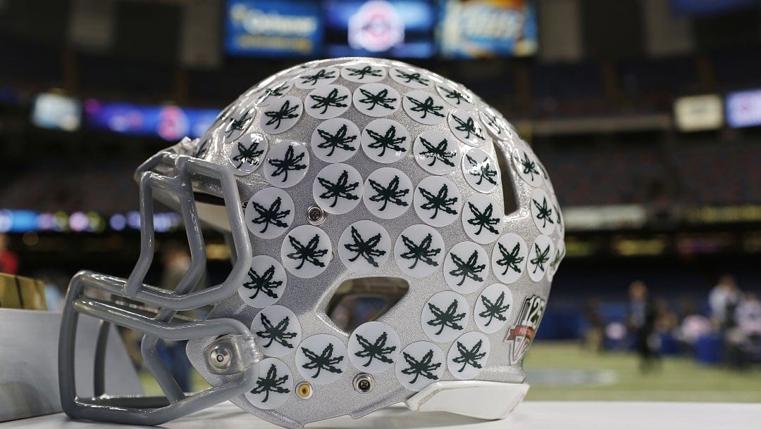 An Ohio State helmet is on display at the Mercedes-Benz Superdome in New Orleans, Tuesday, Dec. 30, 2014. The teams will square off in the Allstate Sugar Bowl NCAA football game, which will be played on New Year's Day.