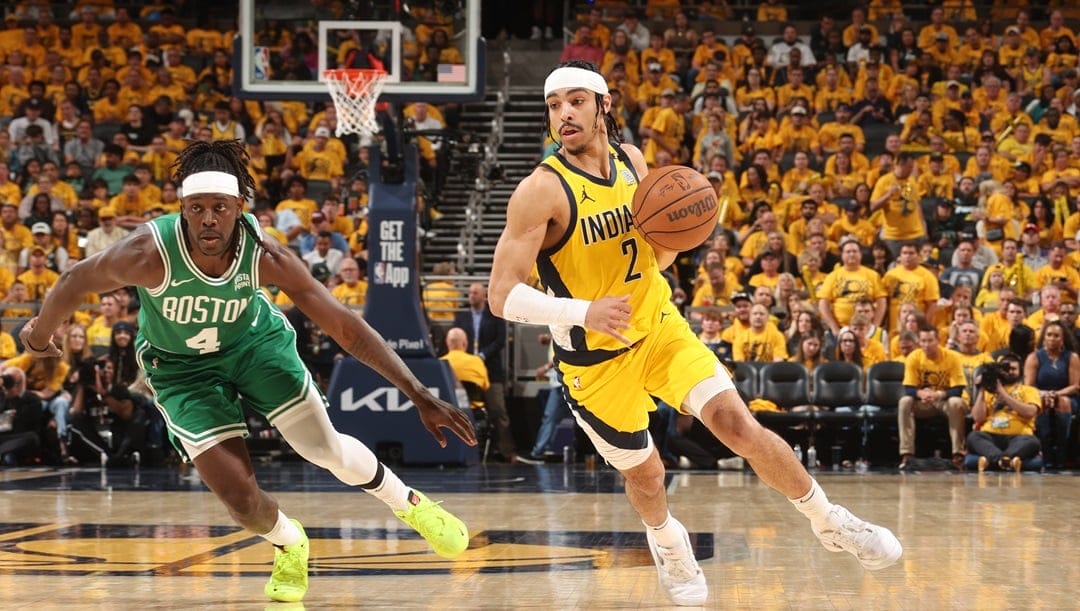 INDIANAPOLIS, IN - MAY 25: Andrew Nembhard #2 of the Indiana Pacers dribbles the ball during the game against the Boston Celtics during Game 3 of the Eastern Conference Finals of the 2024 NBA Playoffs on May 25, 2024 at Gainbridge Fieldhouse in Indianapolis, Indiana.