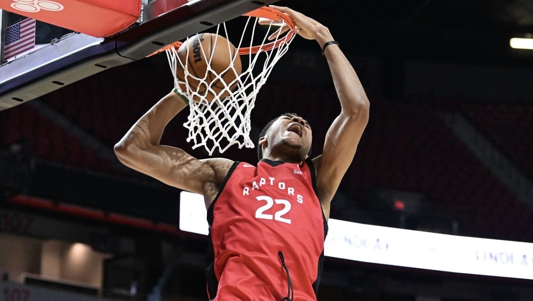 LAS VEGAS, NEVADA - JULY 17: Ulrich Chomche #22 of the Toronto Raptors dunks the ball in the second half of a 2024 NBA Summer League game against the Utah Jazz at the Thomas & Mack Center on July 17, 2024 in Las Vegas, Nevada. The Jazz defeated the Raptors 86-76.