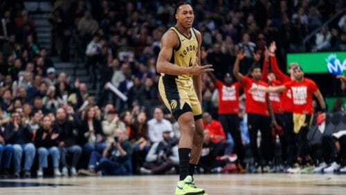 TORONTO, CANADA - FEBRUARY 22: Scottie Barnes #4 of the Toronto Raptors reacts against the Brooklyn Nets in the first half of their NBA game at Scotiabank Arena on February 22, 2024 in Toronto, Canada.