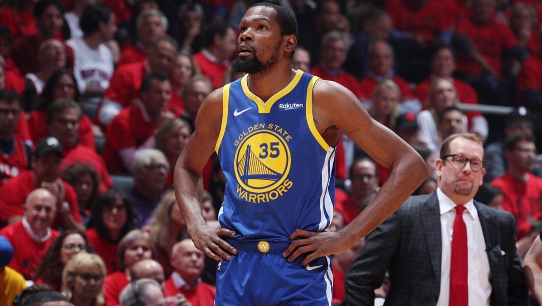 TORONTO, CANADA - JUNE 10: Kevin Durant #35 of the Golden State Warriors looks on against the Toronto Raptors during Game Five of the NBA Finals on June 10, 2019 at Scotiabank Arena in Toronto, Ontario, Canada.