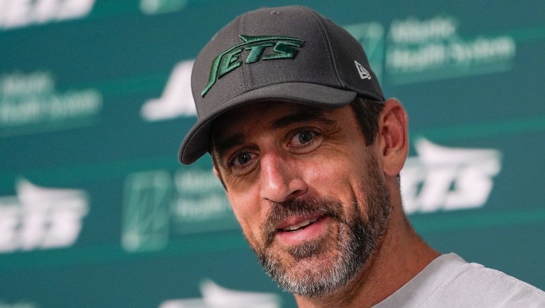 New York Jets quarterback Aaron Rodgers talks to reporters after a practice at the NFL football team's training facility in Florham Park, N.J., Tuesday, May 21, 2024. (AP Photo/Seth Wenig)