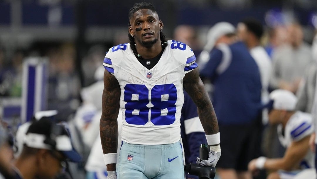 Dallas Cowboys wide receiver CeeDee Lamb walks on the sideline during the second half of an NFL football game against the Green Bay Packers, Sunday, Jan. 14, 2024, in Arlington, Texas.
