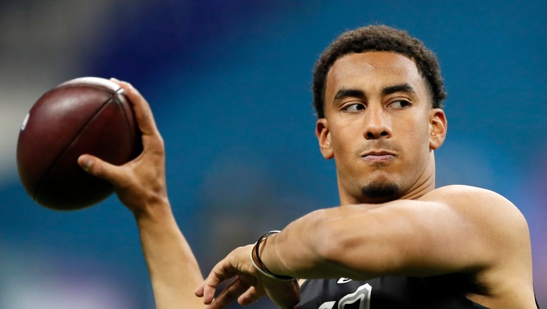 FILE - In this Thursday, Feb. 27, 2020, file photo, Utah State quarterback Jordan Love works out at the NFL football scouting combine in Indianapolis. After turning heads last month at the Senior Bowl, Love delivered with another impressive workout Thursday. (AP Photo/Charlie Neibergall, File)