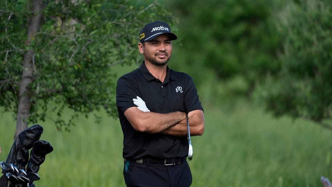 Jason Day stands before taking his shot from the rough on the 10th hole during the first round of the Byron Nelson golf tournament in McKinney, Texas, Thursday, May 2, 2024.