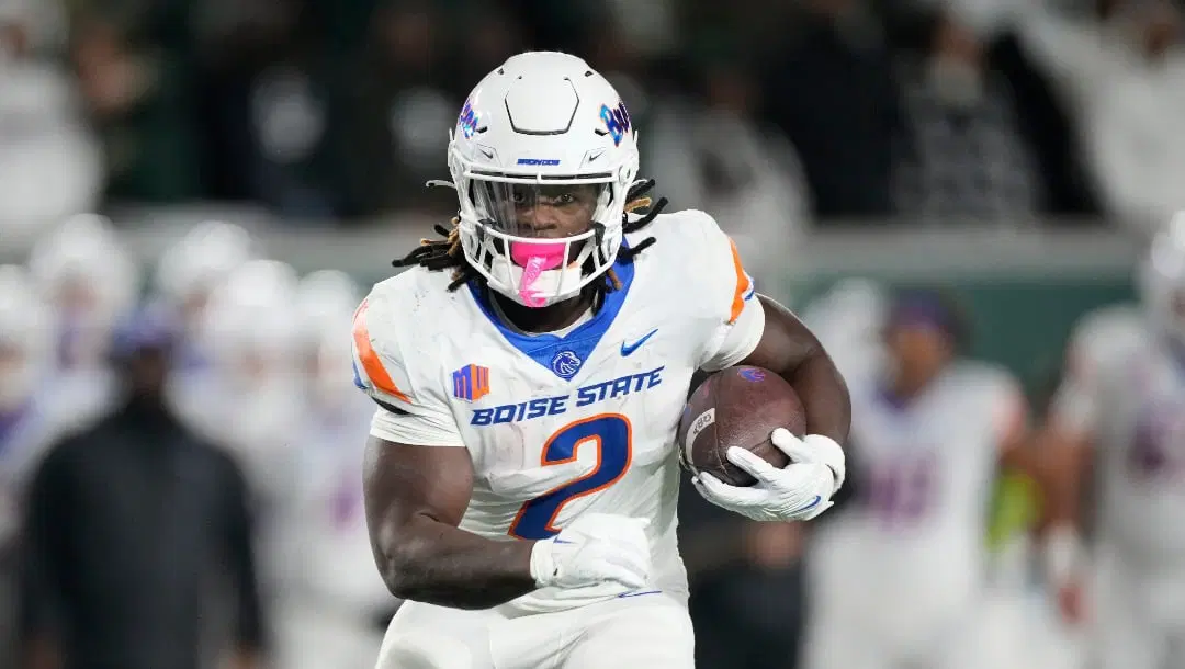 Boise State running back Ashton Jeanty runs for a short gain in the first half of an NCAA college football game against Colorado State on Saturday, Oct. 14, 2023, in Fort Collins, Colo. (AP Photo/David Zalubowski)