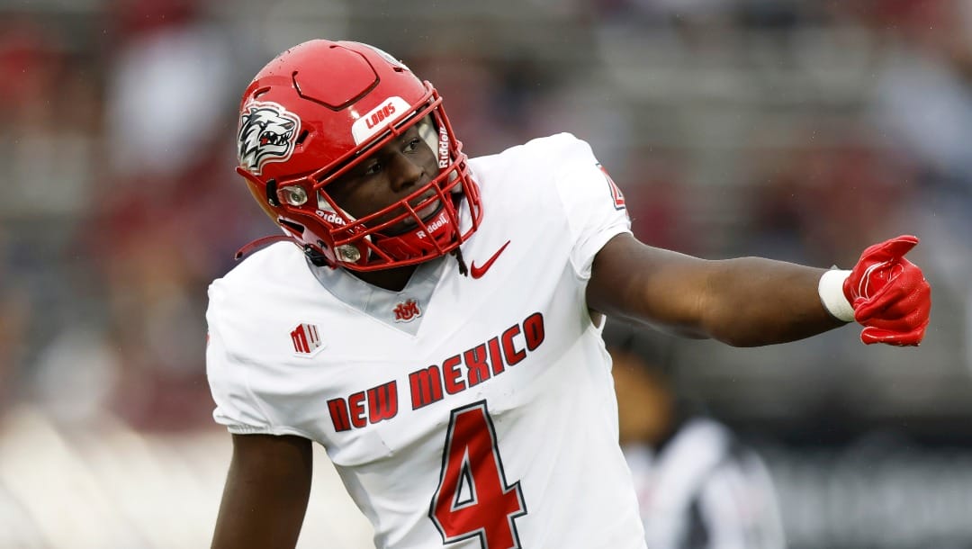 New Mexico wide receiver Caleb Medford (4) signals during the first half of an NCAA football game against UMass on Saturday, Sept. 23, 2023, in Amherst, Mass. (AP Photo/Greg M. Cooper)