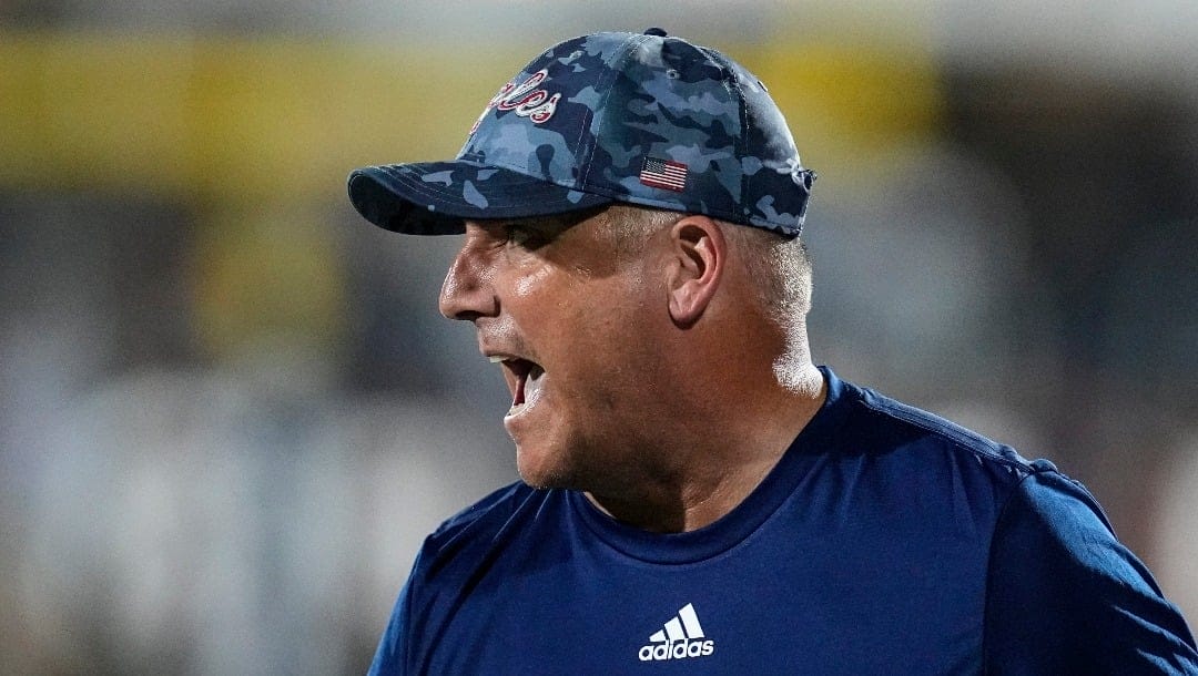 Georgia Southern head coach Clay Helton walks the sidelines during the first half of an NCAA college football game against Coastal Carolina, Saturday, Sept. 30, 2023, in Statesboro, Ga. (AP Photo/Mike Stewart)