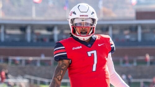 Liberty's Kaidon Salter runs the ball for a touchdown against UMass during the first half of an NCAA college football game, Saturday, Nov. 18, 2023, in Lynchburg, Va. (AP Photo/Robert Simmons)