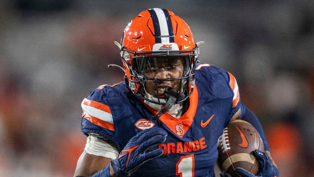 Syracuse running back LeQuint Allen (1) rushes against Georgia Tech during the first half of an NCAA college football game Saturday, Nov. 18, 2023, in Atlanta. (AP Photo/Hakim Wright Sr.)