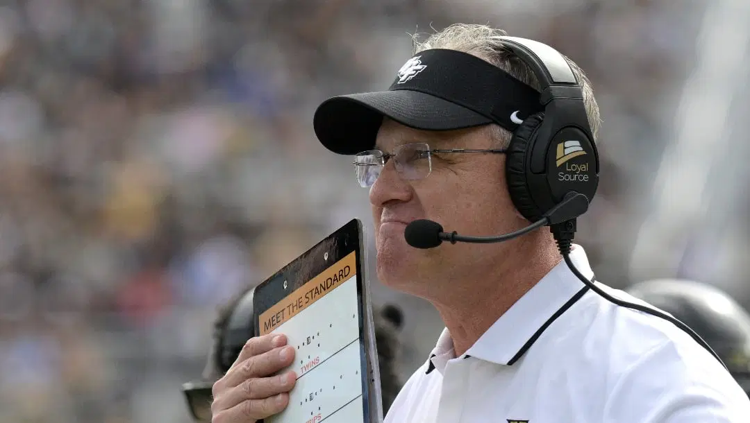 Central Florida head coach Gus Malzahn works from the sideline during the first half of an NCAA college football game against Houston, Saturday, Nov. 25, 2023, in Orlando, Fla. (AP Photo/Phelan M. Ebenhack)