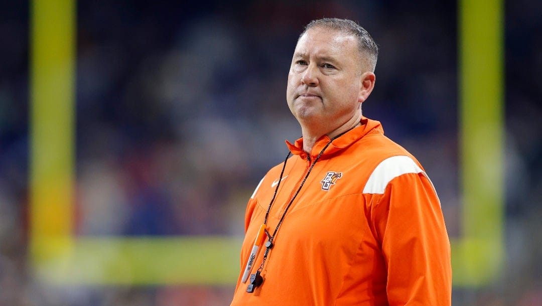 Bowling Green coach Scot Loeffler watches during the Quick Lane Bowl NCAA college football game, Tuesday, Dec. 26, 2023, in Detroit. (AP Photo/Al Goldis)