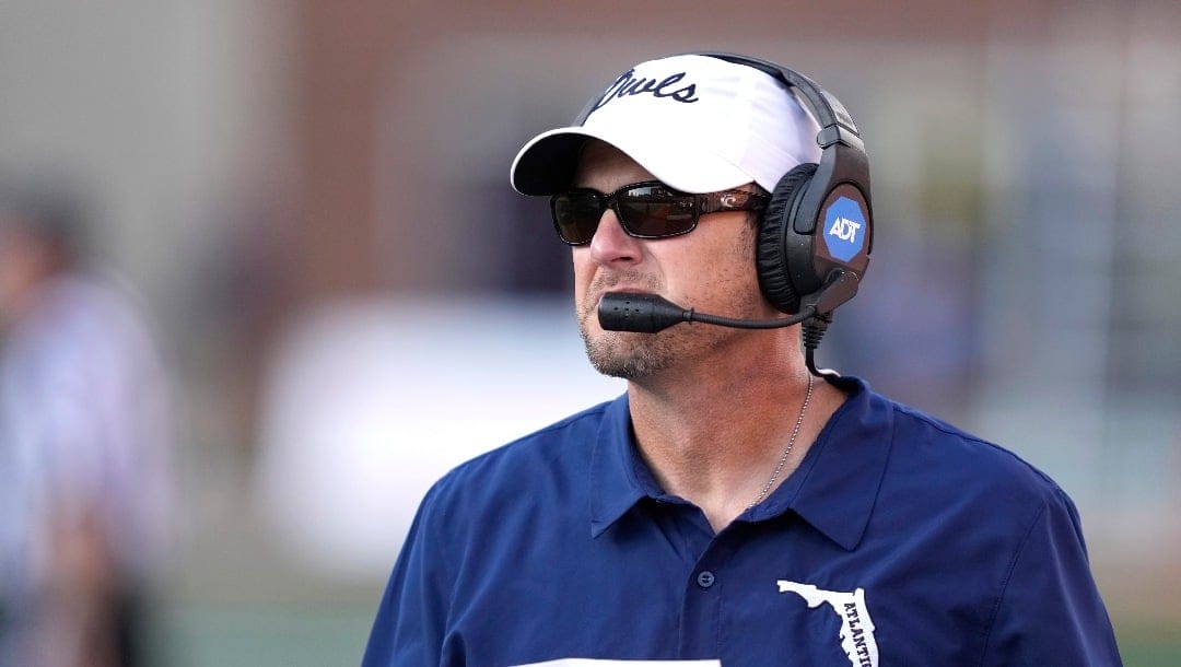 Florida Atlantic head coach Tom Herman walks the sideline during the second half of an NCAA college football game against Illinois, Saturday, Sept. 23, 2023, in Champaign, Ill. Illinois won 23-17. (AP Photo/Charles Rex Arbogast)