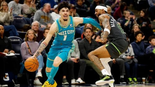 LaMelo Ball #1 of the Charlotte Hornets drives to the basket against Nickeil Alexander-Walker #9 of the Minnesota Timberwolves in the third quarter at Target Center on January 22, 2024 in Minneapolis, Minnesota.