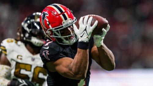 Atlanta Falcons running back Bijan Robinson (7) catches a pass for a touchdown during the second half of an NFL football game against the New Orleans Saints, Sunday, Nov. 26, 2023, in Atlanta. The Atlanta Falcons won 24-15. (AP Photo/Danny Karnik)