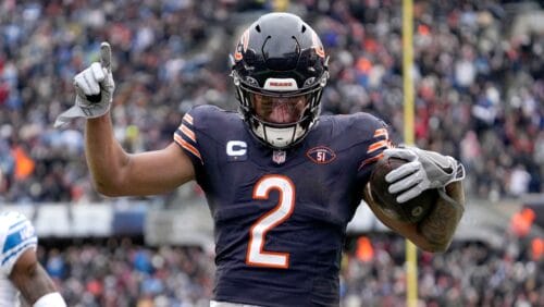 Chicago Bears wide receiver DJ Moore celebrates his touchdown reception from quarterback Justin Fields in the end zone during the second half of an NFL football game against the Detroit Lions Sunday, Dec. 10, 2023, in Chicago. (AP Photo/Nam Y. Huh)