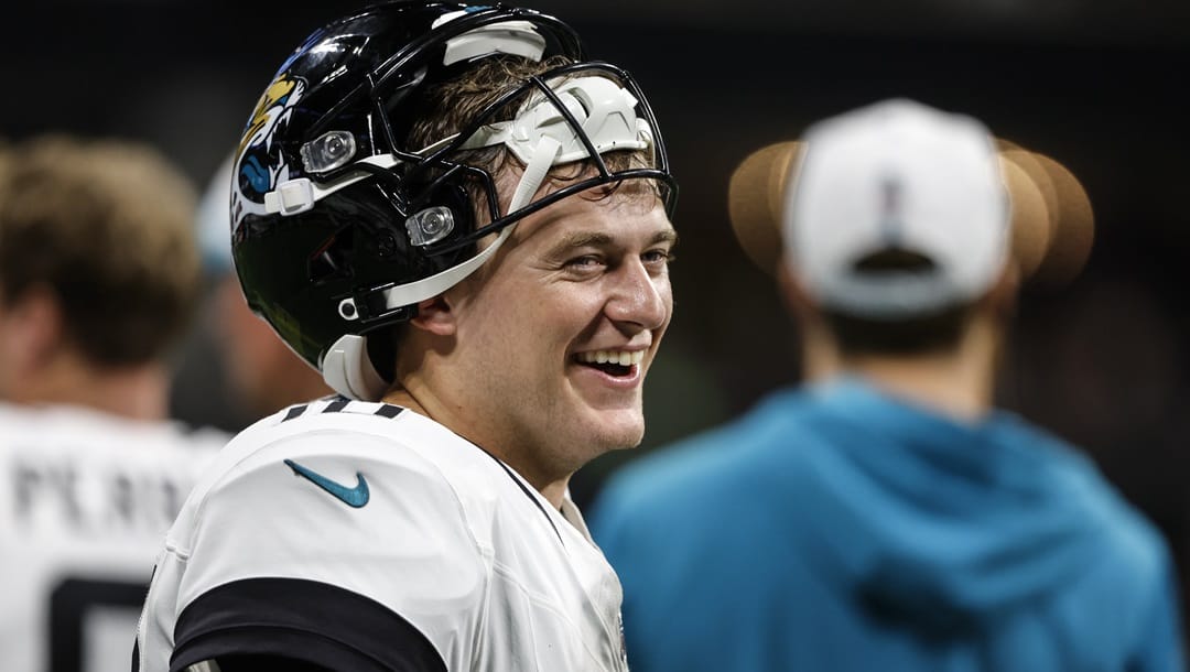 Jacksonville Jaguars quarterback Mac Jones (10) stands on the sidelines in the second half of an NFL preseason footballl game against the Atlanta Falcons, Friday, Aug. 23, 2024, in Atlanta.