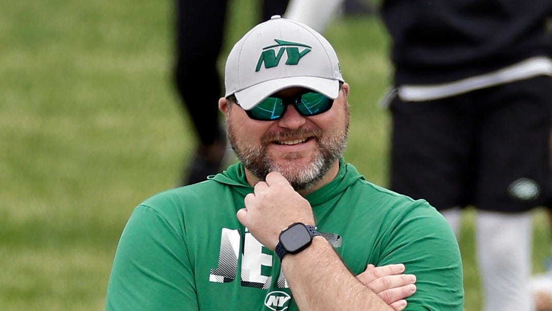 New York Jets general manager Joe Douglas watches NFL rookie minicamp football practice Friday, May 3, 2024, in Florham Park, N.J. (AP Photo/Adam Hunger)