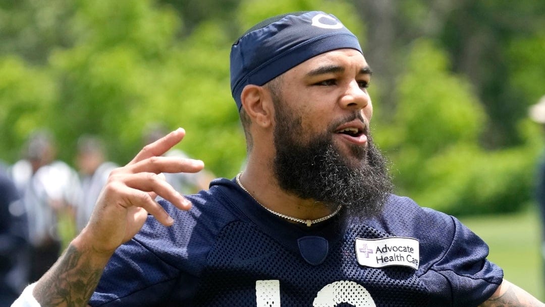 Chicago Bears wide receiver Keenan Allen warms up during NFL football practice at the team's minicamp in Lake Forest, Ill., Wednesday, June 5, 2024. (AP Photo/Nam Y. Huh)