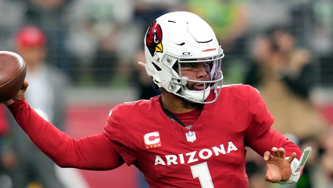 Arizona Cardinals quarterback Kyler Murray passes against the Seattle Seahawks in the first half of an NFL football game Sunday, Jan. 7, 2024, in Glendale, Ariz. (AP Photo/Ross D. Franklin)