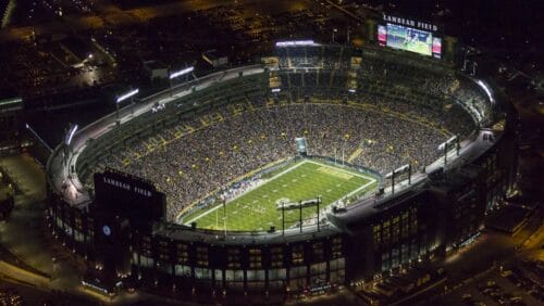 In this Sunday, Nov. 9, 2014 photo, Lambeau Field is seen at night before the Green Bay Packers played the Chicago Bears in an NFL football game in Green Bay, Wis. The Green Bay Packers offered standing-room-only tickets for the first time at Lambeau Field. Sunday night's game against the Chicago Bears and next Sunday's game against the Philadelphia Eagles are test runs for the policy.