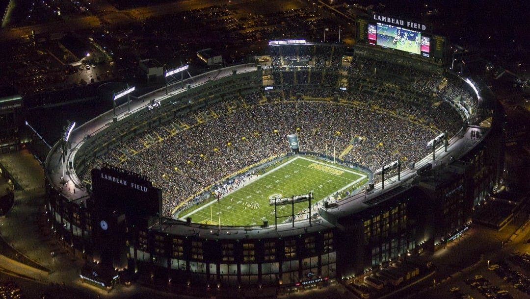 In this Sunday, Nov. 9, 2014 photo, Lambeau Field is seen at night before the Green Bay Packers played the Chicago Bears in an NFL football game in Green Bay, Wis. The Green Bay Packers offered standing-room-only tickets for the first time at Lambeau Field. Sunday night's game against the Chicago Bears and next Sunday's game against the Philadelphia Eagles are test runs for the policy.