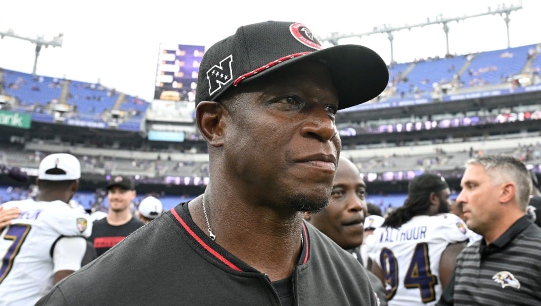 Atlanta Falcons head coach Raheem Morris walks off the field after an preseason NFL football game against the Baltimore Ravens, Saturday, Aug. 17, 2024, in Baltimore. (AP Photo/Terrance Williams)