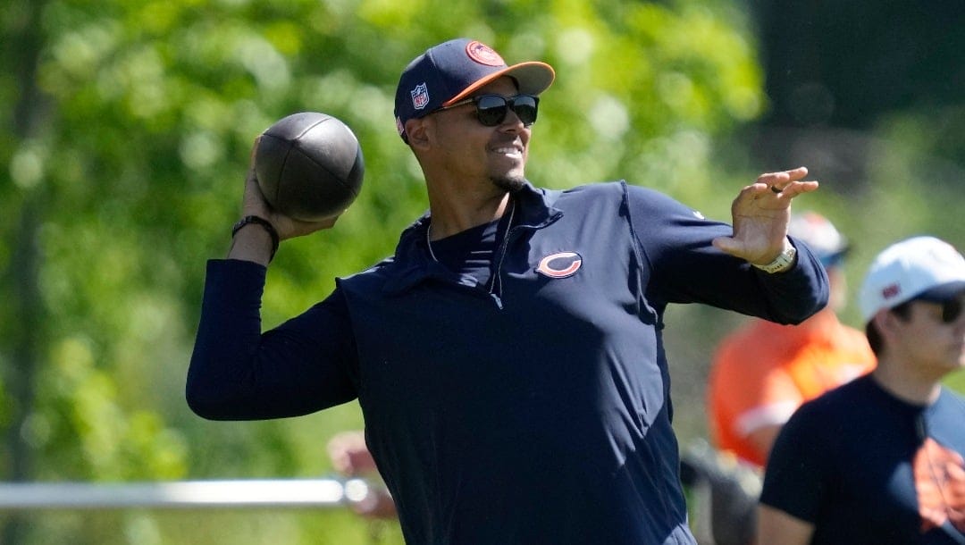 Chicago Bears general manager Ryan Poles throws a ball during the NFL football team's minicamp in Lake Forest, Ill., Thursday, June 6, 2024. (AP Photo/Nam Y. Huh)