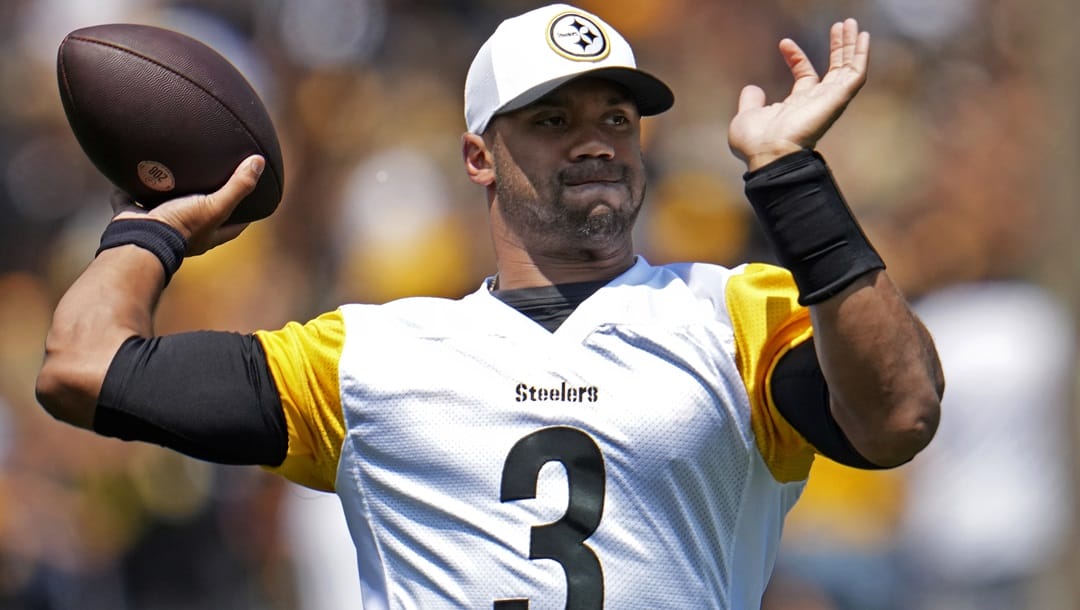 Pittsburgh Steelers quarterback Russell Wilson (3) throws a pass during the NFL football team's training camp in Latrobe, Pa., Saturday, July 27, 2024.