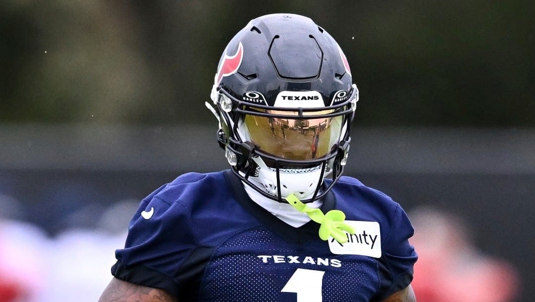 Houston Texans wide receiver Stefon Diggs (1) participates in a drill during NFL football training camp, Thursday, July 18, 2024, Houston. (AP Photo/Maria Lysaker)