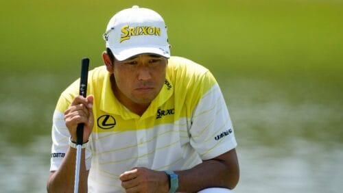 Hideki Matsuyama, of Japan, lines up a putt on the ninth green during the final round of the St. Jude Championship golf tournament Sunday, Aug. 18, 2024, in Memphis, Tenn.