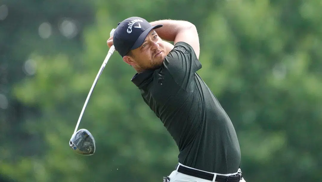 Xander Schauffele hits from the third tee during the final round of the St. Jude Championship golf tournament Sunday, Aug. 18, 2024, in Memphis, Tenn.