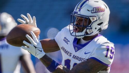 James Madison wide receiver Taji Hudson (19) catches a ball during warmups before an NCAA college football game against Georgia State, Saturday, Nov. 4 2023, in Atlanta, Ga. (AP Photo/Hakim Wright Sr.)