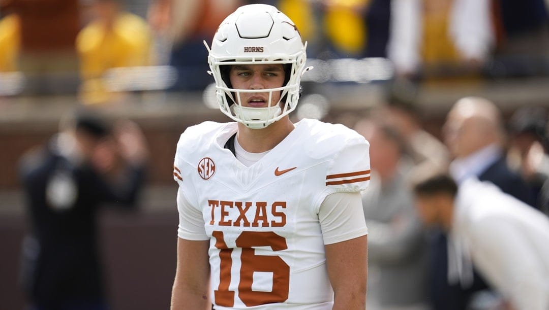 Texas quarterback Arch Manning watches against Michigan in the first half of an NCAA college football game in Ann Arbor, Mich., Saturday, Sept. 7, 2024.