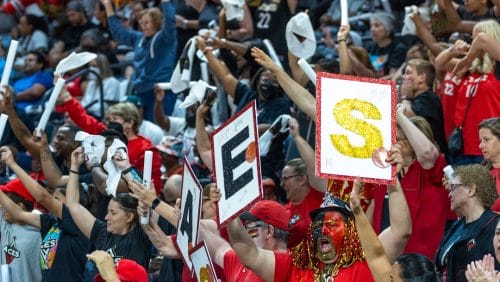 Las Vegas Aces fans cheer as the team leads the Connecticut Sun during the second half in Game 1 of a WNBA basketball final playoff series Sunday, Sept. 11, 2022, in Las Vegas. (AP Photo/L.E. Baskow)