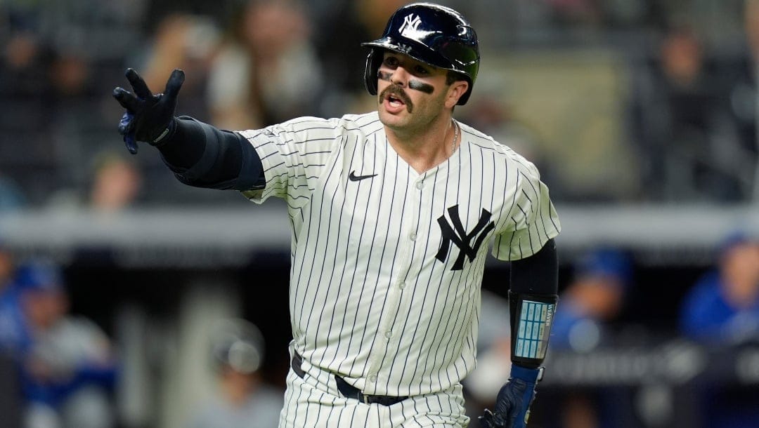 New York Yankees' Austin Wells reacts after hitting a three-run home run during the seventh inning of a baseball game against the Kansas City Royals at Yankee Stadium Monday, Sept. 9, 2024, in New York.