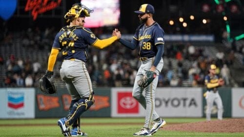 Milwaukee Brewers catcher William Contreras, left, and pitcher Devin Williams celebrate after the team's victory over the San Francisco Giants in a baseball game, Thursday, Sept. 12, 2024, in San Francisco.