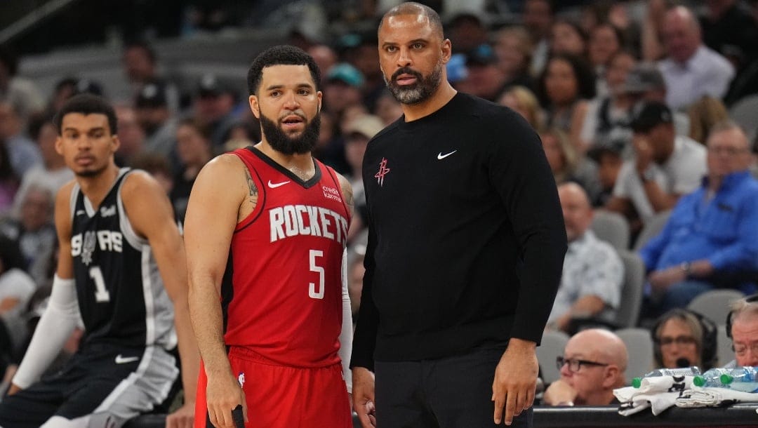 Fred VanVleet #5 talks to Head Coach Ime Udoka of the Houston Rockets during the game against the San Antonio Spurs on March 12, 2024 at the Frost Bank Center in San Antonio, Texas.