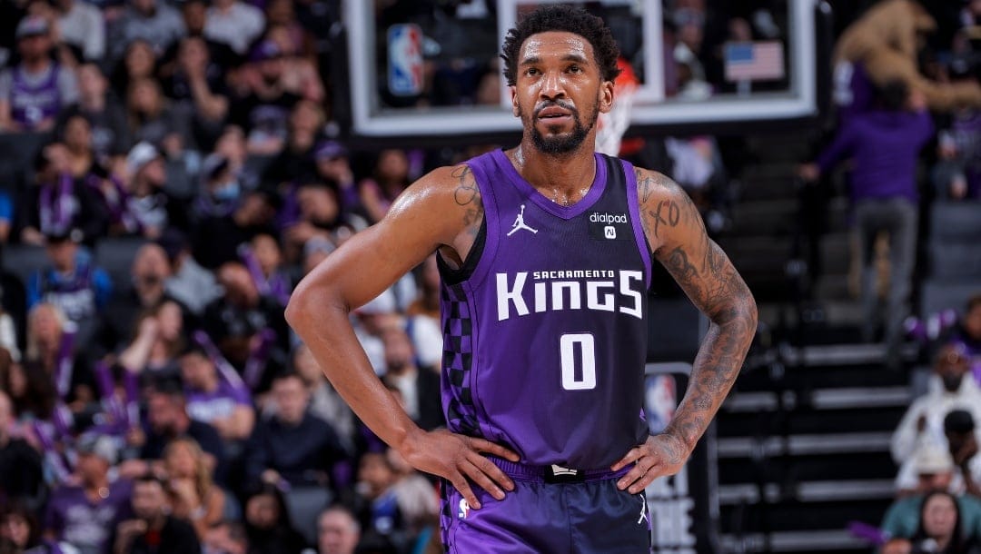 Malik Monk #0 of the Sacramento Kings looks on during the game against the Dallas Mavericks on March 26, 2024 at Golden 1 Center in Sacramento, California.