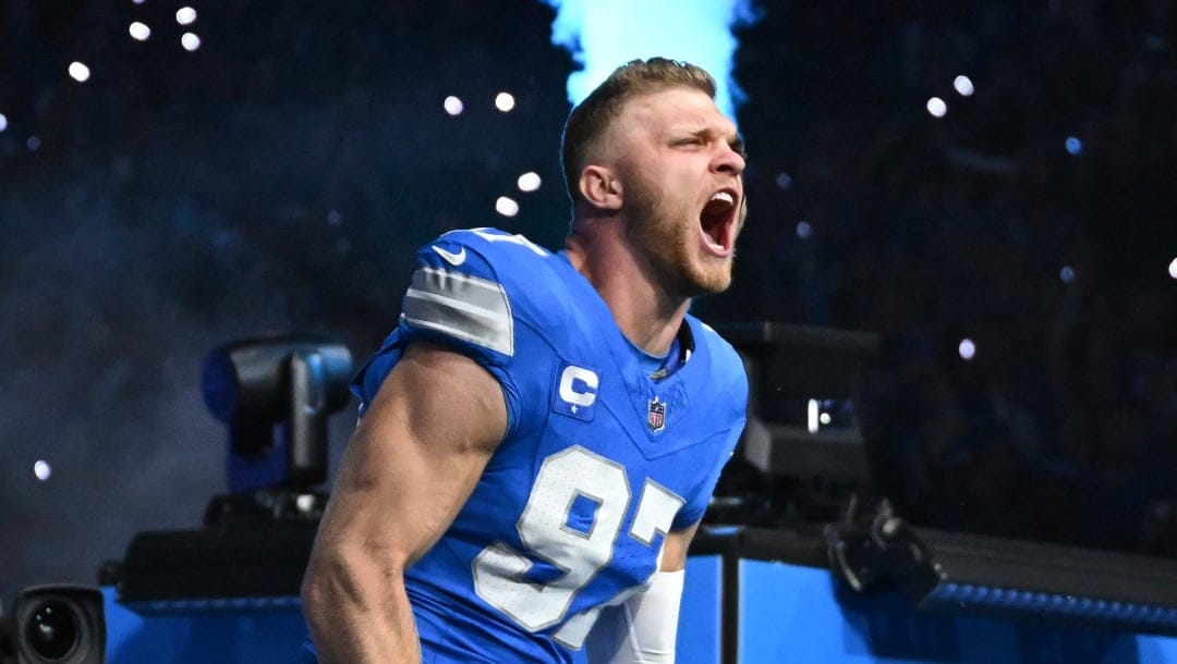 Detroit Lions defensive end Aidan Hutchinson (97) is introduced before an NFL football game against the Los Angeles Rams in Detroit, Sunday, Sept. 8, 2024. (AP Photo/David Dermer)