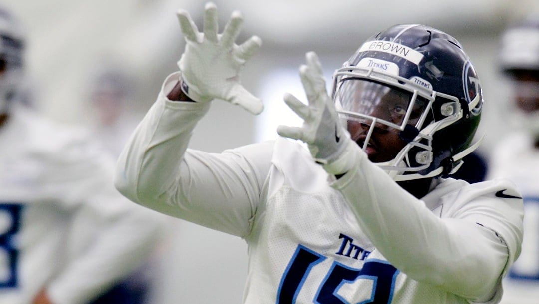 Tennessee Titans wide receiver A.J. Brown (18) catches a pass during NFL football rookie minicamp Saturday, May 11, 2019, in Nashville, Tenn.