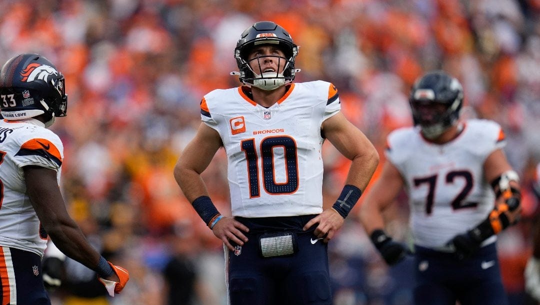 Denver Broncos quarterback Bo Nix (10) reacts during the second half of an NFL football game against the Pittsburgh Steelers, Sunday, Sept. 15, 2024, in Denver.