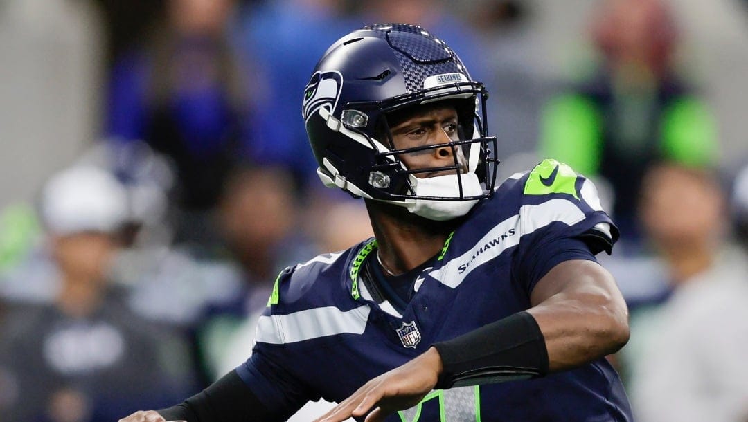 Seattle Seahawks quarterback Geno Smith (7) throws during the first half of a preseason NFL football game against the Cleveland Browns, Saturday, Aug. 24, 2024, in Seattle. (AP Photo/John Froschauer)