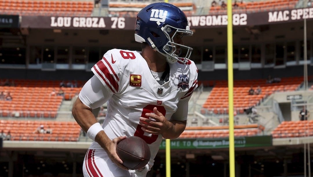 New York Giants quarterback Daniel Jones (8) warms up prior to the start of an NFL football game against the Cleveland Browns, Sunday, Sept. 22, 2024, in Cleveland.