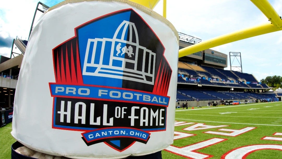 This is the The Pro Football Hall of Fame logo on the goalpost pad on the field at Tom Benson Field before the Hall of Fame exhibition game between the Houston Texans and Chicago Bears, Thursday, Aug. 1, 2024, in Canton, Ohio. (AP Photo/Gene J. Puskar)