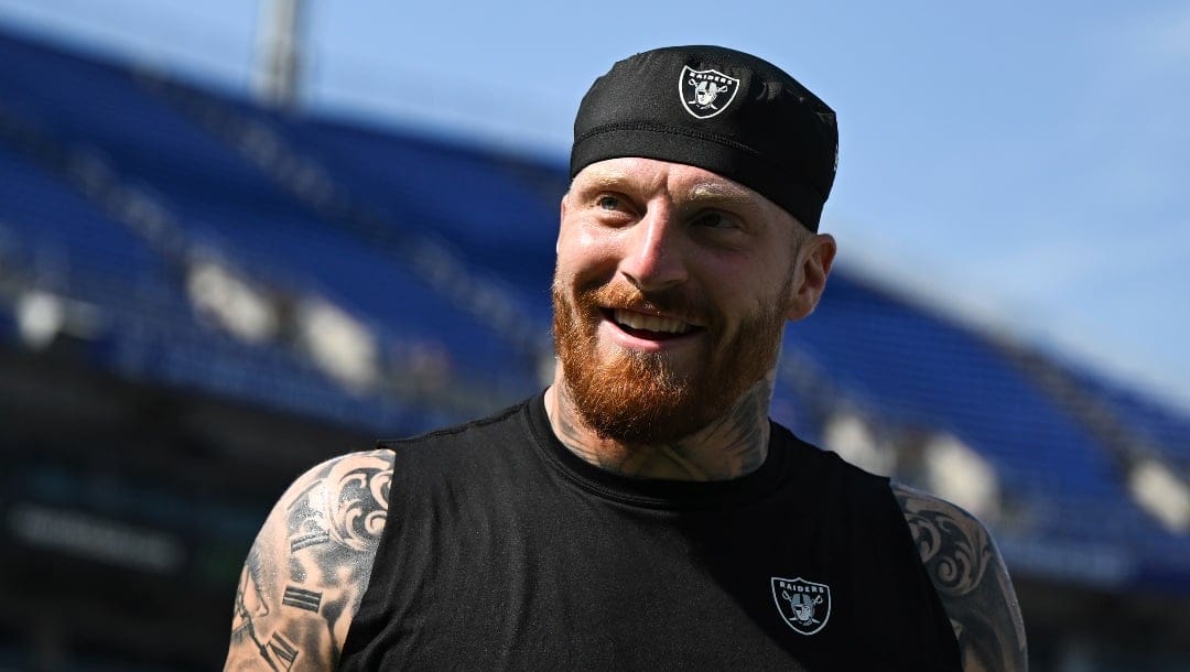 Las Vegas Raiders defensive end Maxx Crosby looks on during pre-game warm-ups before an NFL football game against the Baltimore Ravens, Sunday, Sep. 15, 2024, in Baltimore.